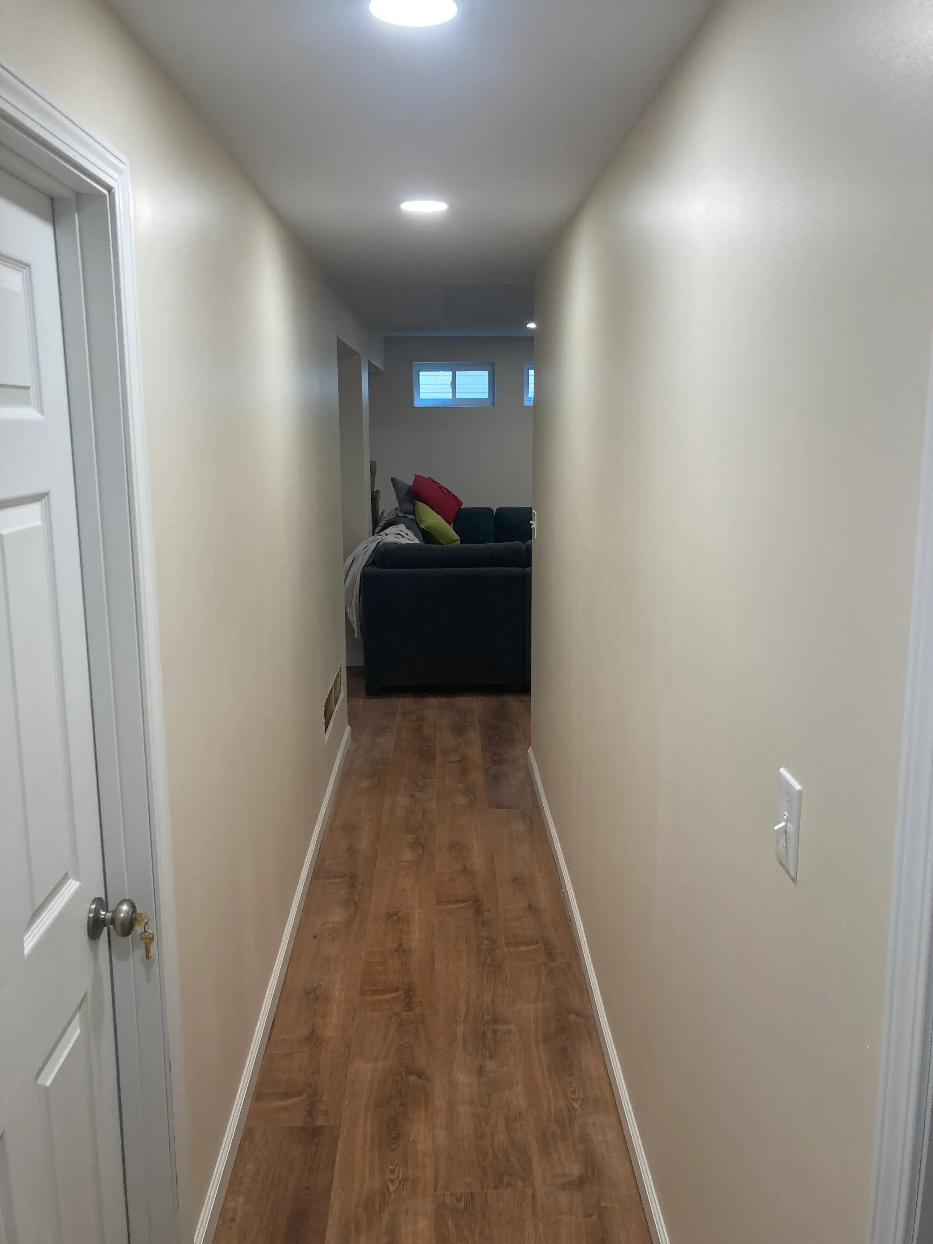 Kitchen with painted ceiling, recessed lights, and wood wainscoting accent wall